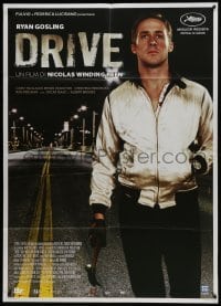 5j410 DRIVE Italian 1p 2011 best close up of Ryan Gosling as the driver holding hammer!
