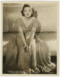 5m926 MYRNA LOY deluxe 10x13 still 1938 seated in pleated dress about to make Too Hot to Handle!