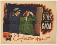 5r366 CONFIDENTIAL AGENT LC 1945 Charles Boyer looks at Lauren 'The Look' Bacall feeling faint!