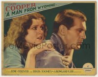 5r653 MAN FROM WYOMING LC 1930 scared June Collyer tightly clings to Gary Cooper from behind!