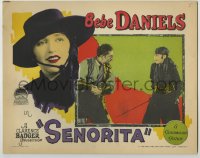5r808 SENORITA LC 1927 wounded William Powell stares closely at mustached Bebe Daniels in disguise!