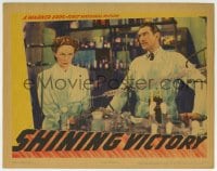 5r819 SHINING VICTORY LC 1941 close up of Geraldine Fitzgerald & James Stephenson in laboratory!