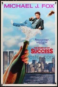 5s751 SECRET OF MY SUCCESS 1sh 1987 wacky image of Michael J. Fox & huge bottle of champagne!