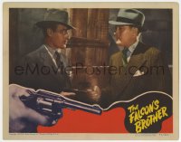 6b168 FALCON'S BROTHER LC 1942 best c/u of George Sanders & Tom Conway pointing guns at each other!