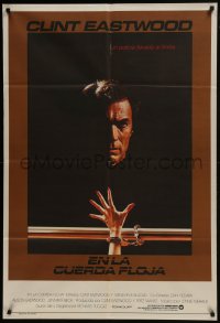 6j239 TIGHTROPE Argentinean 1984 Clint Eastwood is a cop on the edge, cool handcuff image!