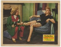 6m381 FOOTLIGHT SERENADE LC 1942 Jane Wyman takes shoe off of dancer Betty Grable's aching foot!