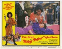 6m394 FRIDAY FOSTER LC #6 1976 close up of Pam Grier talking to wounded woman on the ground!