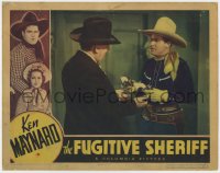 6m396 FUGITIVE SHERIFF LC 1936 close up of Ken Maynard handing over both of his guns!