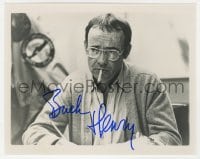 6s704 BUCK HENRY signed 8x10 REPRO still 1980s great c/u wearing glasses with cigarette in mouth!