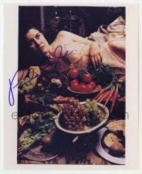 6s903 PAULA COLE signed color 8x9.75 REPRO still 2000s the singer laying on a table full of food!