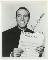 6s505 RICARDO MONTALBAN signed 8x10.25 still 1966 as a priest with sheet music in The Singing Nun!