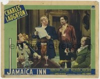 7c598 JAMAICA INN LC 1939 two men stare at Charles Laughton & Robert Newton, Alfred Hitchcock!