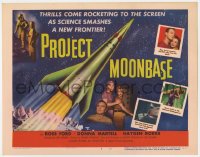 7c182 PROJECT MOONBASE TC 1953 Robert Heinlein, cool art of rocket ship + wacky astronauts!