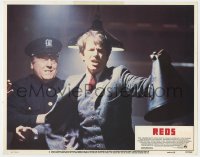 7c834 REDS LC #5 1981 cop tries to restrain star/director Warren Beatty holding megaphone!
