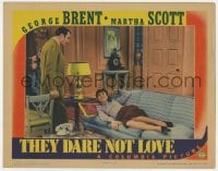 7c930 THEY DARE NOT LOVE LC 1941 pretty Kay Linaker laying on couch smiles up at George Brent!