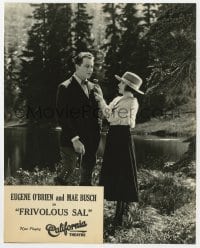 7h382 FRIVOLOUS SAL 7.5x9.5 still 1925 pretty Mae Busch gives a flower to Eugene O'Brien by lake!
