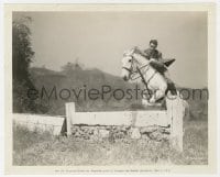 7h756 RAY MILLAND 8.25x10 still 1937 taking a jump astride his charger, starring in Easy Living!