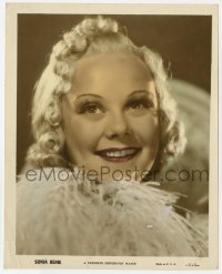 7h032 SONJA HENIE color-glos 8x10 still 1930s super close smiling portrait wearing feathers!