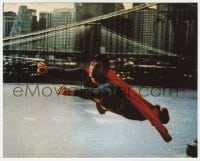 7h037 SUPERMAN color 8x10 still 1978 cool fx scene of costumed Christopher Reeve flying by bridge!
