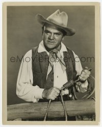 7h926 TRIBUTE TO A BAD MAN 8x10.25 still 1956 great close up of cowboy James Cagney holding noose!