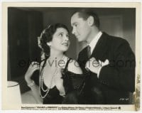 7h930 TROUBLE IN PARADISE 8x10.25 still 1932 Herbert Marshall helps Kay Francis with her shawl!