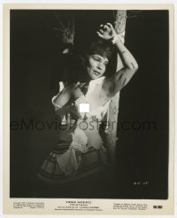 7h948 VIRGIN SACRIFICE 8.25x10 still 1959 c/u of woman in shredded clothes tied to tree!