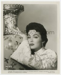7s363 BARBARA RUSH signed 8.25x10 still 1955 Universal Pictures studio portrait by huge vase!