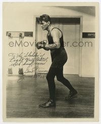 7s436 GENE TUNNEY signed 8x10 still 1926 great full-length pose w/boxing gloves in fighting stance!