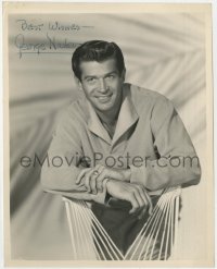 7s439 GEORGE NADER signed 8x10 still 1950s great smiling portrait leaning on back of chair!