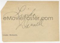 7s252 LINDA DARNELL signed 4x5 cut album page 1960s includes a lobby card from Unfaithfully Yours!