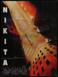 7y794 LA FEMME NIKITA French 1p 1990 Luc Besson, cool overhead art of Anne Parillaud in alley!