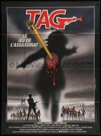 7y939 TAG: THE ASSASSINATION GAME French 1p 1983 Landi art of bloody dart hitting silhouette!
