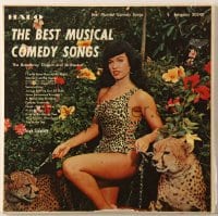 7y009 BEST MUSICAL COMEDY SONGS 33 1/3 RPM record 1957 sexy Bettie Page with cheetahs on the cover!