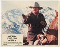 8d832 SHOOTIST LC #3 1976 close up of cowboy John Wayne on horseback pointing derringer!