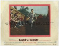 8j547 EAST OF EDEN LC #1 1955 concerned James Dean running past sitting men, John Steinbeck, Kazan!