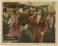 8j579 FLYING HORSEMAN LC 1926 close up of Buck Jones slugging guy with guy on busy street!