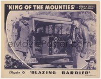 8j674 KING OF THE MOUNTIES chapter 6 LC 1942 two guys standing by device in truck, Blazing Barrier!