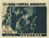 8j676 KING OF THE ROYAL MOUNTED chapter 5 LC 1940 Mountie Rocky Lane with his gun drawn, Sabotage!