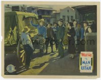 8j704 MAN FROM UTAH LC R1930s John Wayne showing contents of stagecoach to townspeople, rare!