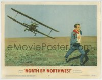 8j770 NORTH BY NORTHWEST LC #2 1959 Hitchcock, classic c/u of Cary Grant chased by crop duster!