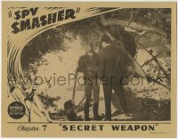 8j890 SPY SMASHER chapter 7 LC 1942 c/u of Kane Richmond standing by airplane, Secret Weapon!