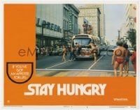 8j895 STAY HUNGRY LC #4 1976 lots of massive bodybuilders on and around Birmingham bus, Bob Rafelson