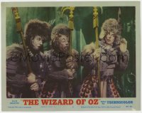 8j987 WIZARD OF OZ LAMINATED LC #2 R1955 Tin Man, Lion & Scarecrow disguised as guards in castle!