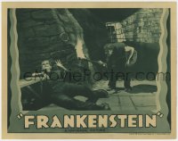 8r002 FRANKENSTEIN LC R1938 Dwight Frye as Fritz holding torch by chained monster Boris Karloff!