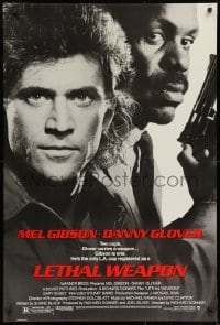 8w520 LETHAL WEAPON 1sh 1987 great close image of cop partners Mel Gibson & Danny Glover!
