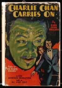 8x079 CHARLIE CHAN CARRIES ON Grosset & Dunlap movie edition hardcover book 1931 Warner Oland's 1st!