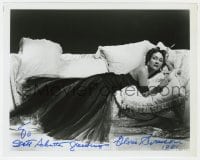8y745 GLORIA SWANSON signed 8x10 REPRO still 1981 full-length portrait on couch from Sunset Blvd!
