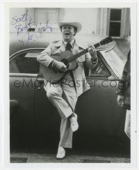 8y889 NED BEATTY signed 8x10 REPRO still 1980s full-length close up playing guitar by car!