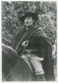 8y958 STACY KEACH signed 6.5x9.5 REPRO still 1980s close up riding horse with cape & hat!