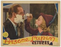 9b050 ARSENE LUPIN RETURNS LC 1938 great c/u of Virginia Bruce sloppily shaving Melvyn Douglas!